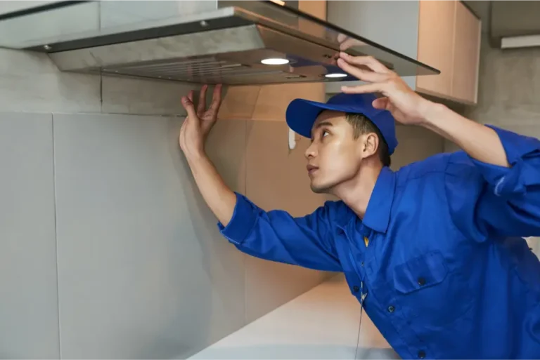 Abilene Appliance Repair technician servicing vent hood